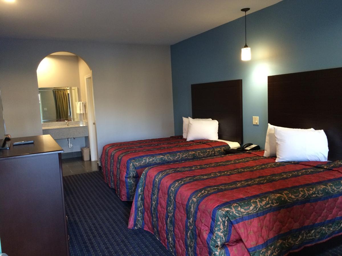 Classic Inn & Suites Humble Habitación foto