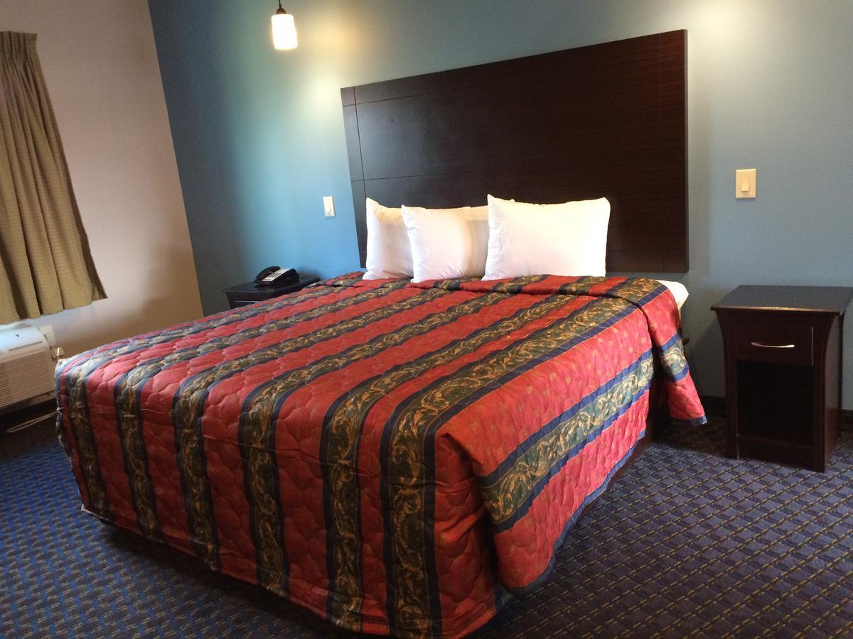 Classic Inn & Suites Humble Habitación foto